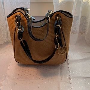 Michael Kors straw and leather bag